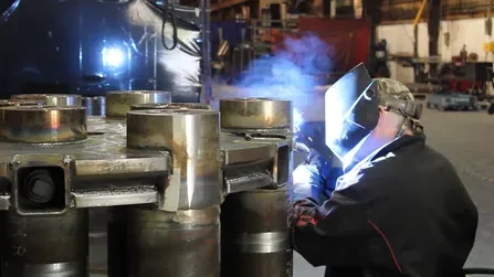 A photo of a man who is welding