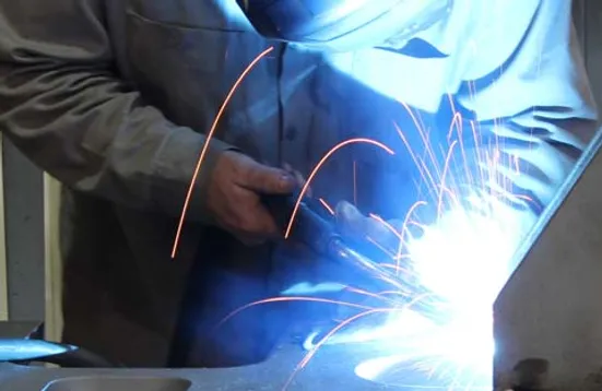 A photo of a person who is welding