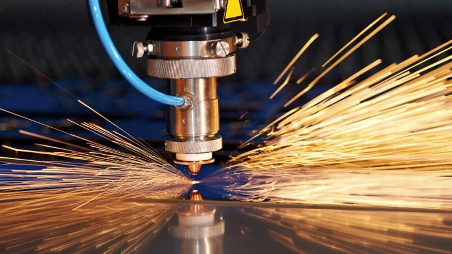 A photo of a machine cutting metal